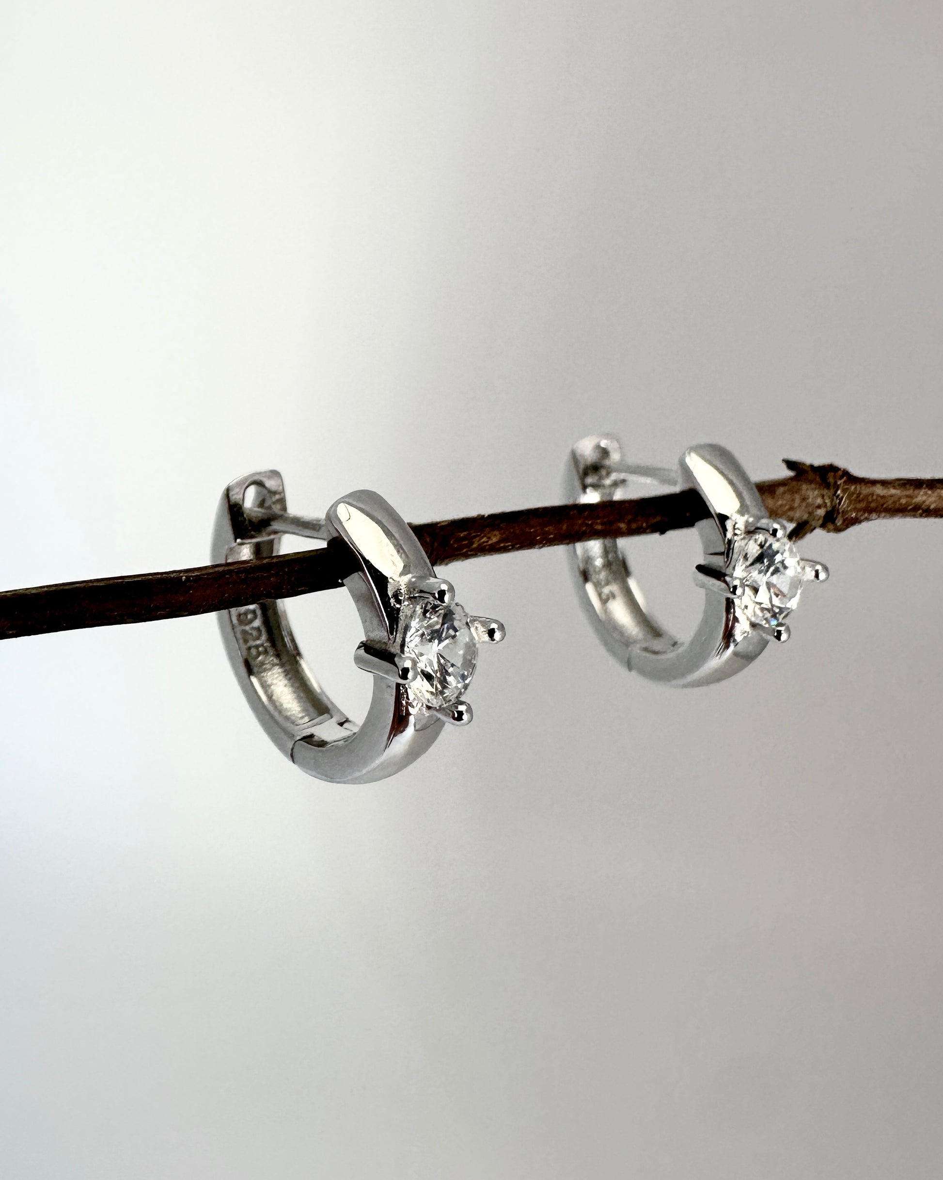 Candella Solitaire CZ Huggie Earrings Silver 